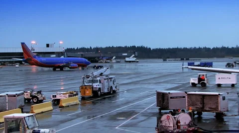 Loading airplane.  Stock Footage 975177