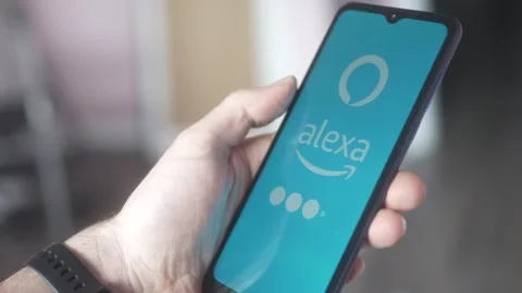 Loading the Amazon Alexa App on a Mobile Phone Screen Closeup Stock Footage 240782985