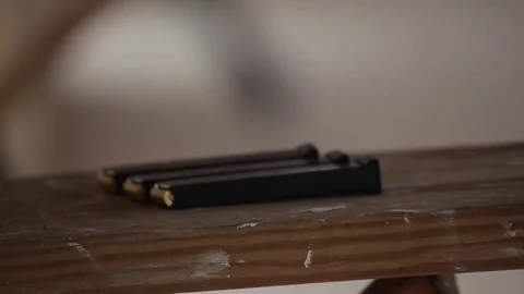 Loading and firing a gun Video stock 76940207