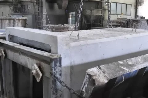 Loading and moving finished concrete product from the mold after hardening Stock Photos