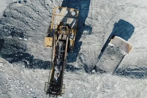 Loading and transportation of stone chips on dump trucks in quar Stock Photos