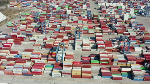 Loading and unloading a container ship in a cargo sea port. Stock Footage 211801360