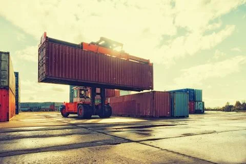 Loading and unloading of containers in the port Stock Photos