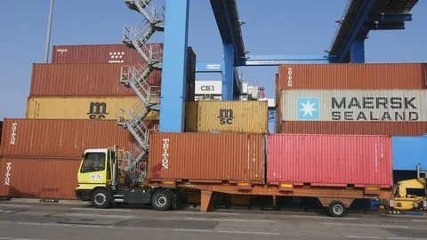 Loading and unloading maneuvers in the container terminal 4k Stock Footage 89965157