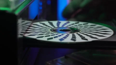 Loading Audio Compact Disc in CD Player, Close Up Stockbeeldmateriaal 325785656