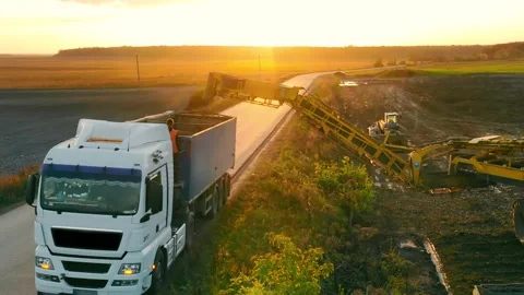 Loading the beet crop at sunset Stock Footage 234784846