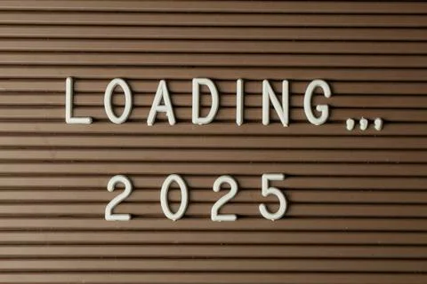 Loading brown letter board 2025 close-up, new year's resolution 2025 Stock Photos