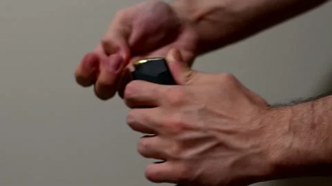 Loading Bullets Into a Clip Stock Footage 167804506
