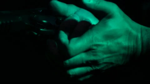 Loading bullets into a gun. Insert catridge into a gun. Stock Footage 146200901