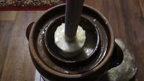 Loading cabbage, sauerkraut, into a clay barrel Stock Footage 164116336