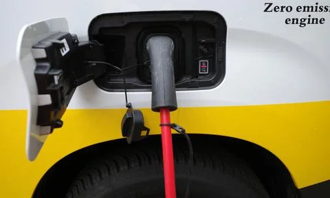 Loading cable in a zero emission car Stock Photos