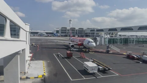 Loading cargo to aeroplane at KLIA2 Stock Footage 91563342