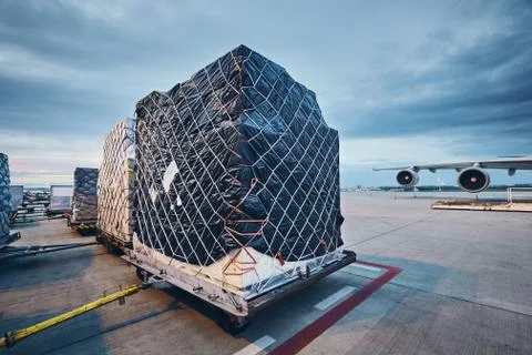 Loading cargo to airplane Stock-Fotos