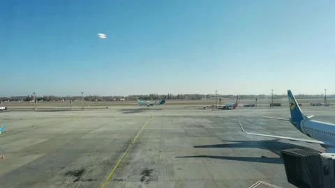 Loading cargo and passengers boarding of plane at Boryspil Airport Stock Footage 194907283