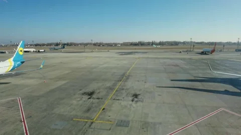 Loading cargo and passengers boarding of plane at Boryspil Airport Stock Footage 194907325