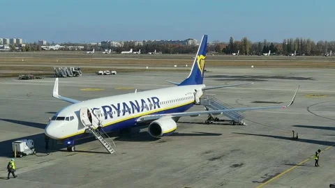 Loading cargo and passengers boarding of plane at Boryspil Airport Stock Footage 194907468