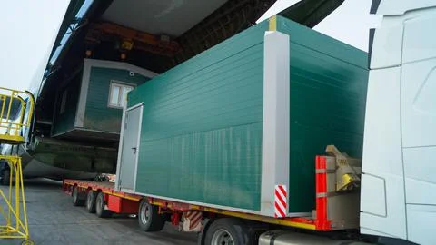 Loading cargo into a cargo plane. Stock-Fotos
