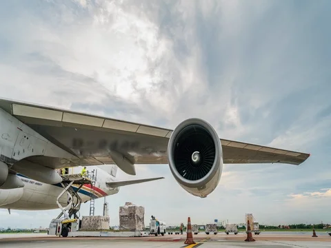 Loading cargo plane outside air freight logistic Видео 76239788