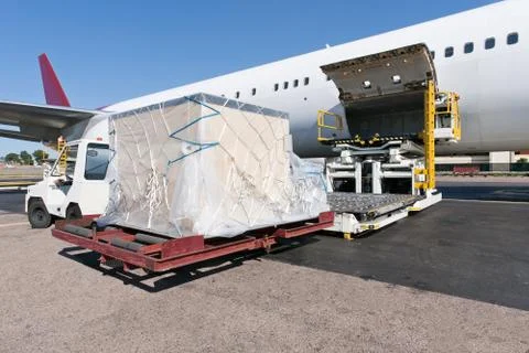 Loading cargo plane Stock Photos