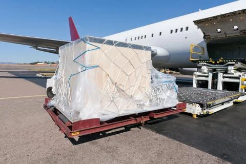 Loading cargo plane Stock Photos