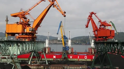 Loading cargo ship coal to the port of Nakhodka. Primorsky Kray, Russia Stock Footage 56664224