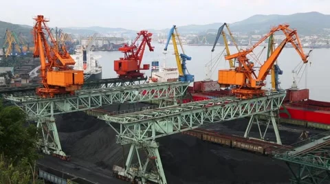 Loading cargo ship coal to the port of Nakhodka. Primorsky Kray, Russia Stock-Footage 56664941
