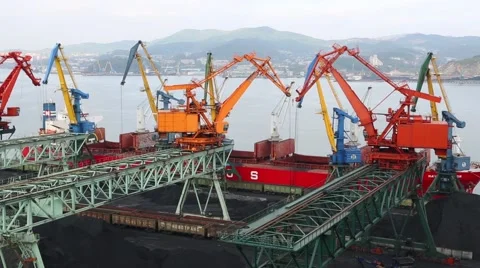 Loading cargo ship coal to the port of Nakhodka. Primorsky Kray, Russia Stock-Footage 56665002