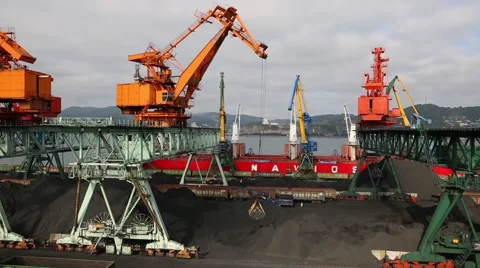 Loading cargo ship coal to the port of Nakhodka. Primorsky Kray, Russia Stock Footage 58411789