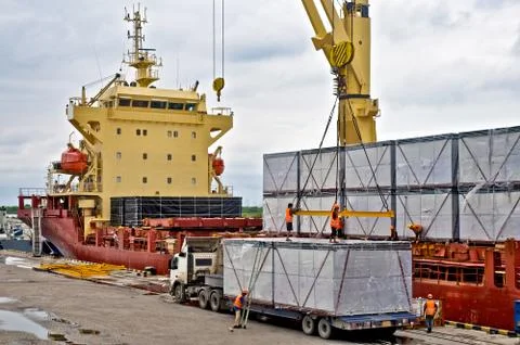 Loading cargo into the ship Stock Photos