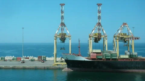 Loading of cargoes on the cargo ship Stock Footage 693482