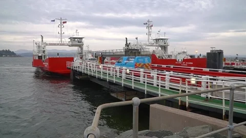 Loading cars onto the Sound of Soay, Dunoon pier, Scotland Stock Footage 237898368