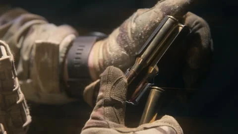 Loading cartridges into the magazine Video stock 297490152