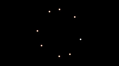 Loading circle animation with bright dots on black background. 库存影片 337601577