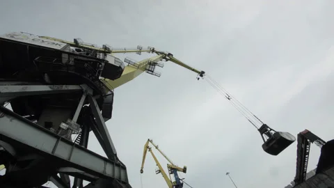 Loading coal anthracite mining in port on cargo tanker ship with crane bucket of Stock Footage 205232106