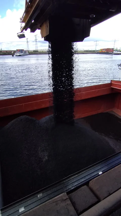 Loading Coal into Barge from conveyor belt, Port of Rotterdam Stock Footage 199961871