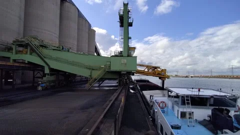 Loading Coal into barge through a conveyor belt system Stock Footage 199962043