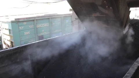 Loading of coal in coaches of the train. Stock Footage 76142187