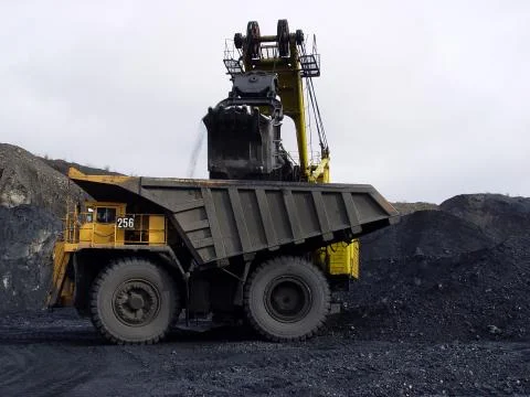 Loading coal into a mining dump truck. Yakutia. Russia Stock Photos