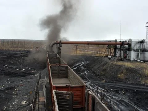 Loading of coal into wagons at the processing plant. Yakutia. Russia Stock Photos