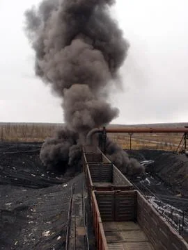 Loading of coal into wagons at the processing plant. Yakutia. Russia Stock Photos