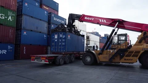 Loading a container onto a car. Stock Footage 148139401