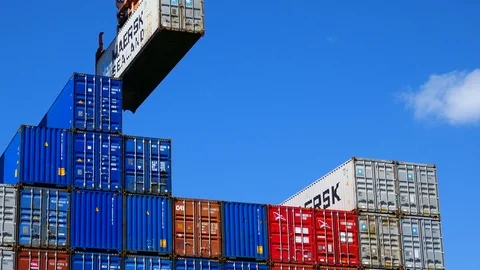 Loading container to ship by crane 4k intro video for business Stock Footage 105453632