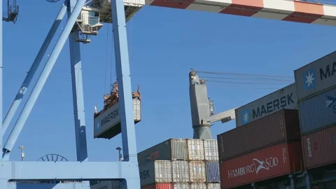 Loading container to ship by industrial line gantry crane 4k creative business Stock Footage 164776039