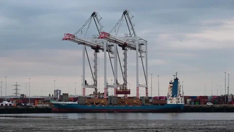 Loading a container ship at Southampton harbour Stock Footage 277634836