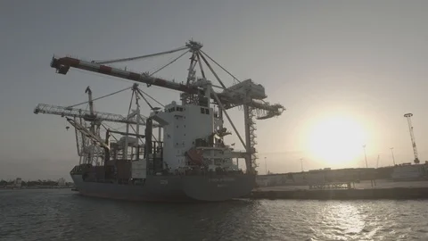 Loading Containers onto Cargo Ships Stock Footage 123389578