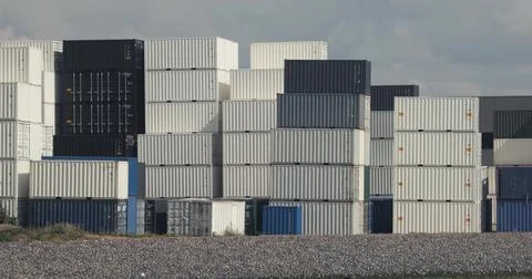 Loading containers on a ship Stock Photos