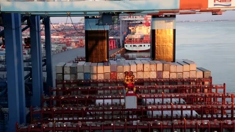 Loading containers ship Port of Gothenburg, Sweden Golden hour Stock Footage 169889705