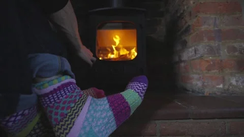 Loading cozy wood burning stove Stock Footage 252885138