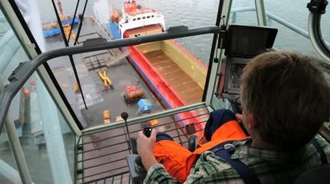 Loading crane operator at work. Stock Footage 39086583