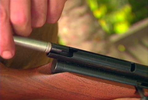 Loading dart gun Stock Footage 607599